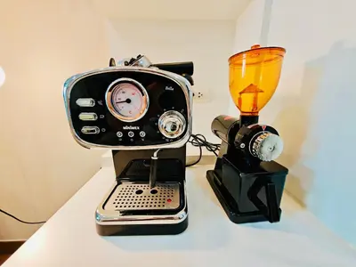 a toaster and a blender on a table at Downtown, Cozy 1BR, 48sqm, Middle of ThongLo, High Floor, Pool, Gym, Fast Wifi in Bangkok