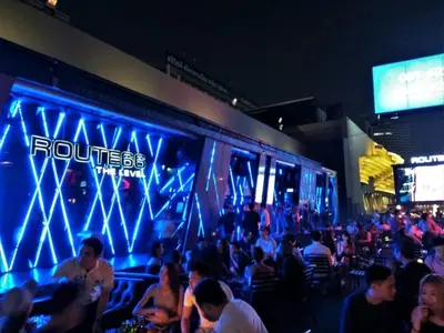 a crowd of people sitting in front of a stage at In Unit Workspace Gym and Infinity Pool MRT 200m in Bangkok