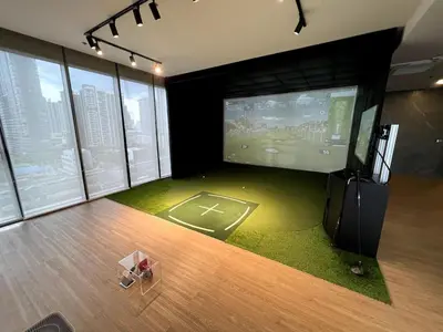 a room with a baseball game on a large screen at 52nd Fl Apt with Desk Pool and Gym MRT 200m Away in Ban Na Song