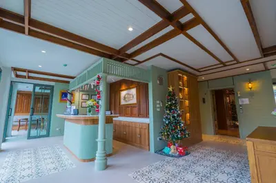 a kitchen with a christmas tree in the middle at TUAN Hotel Bangkok in Bangkok Yai