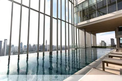 a swimming pool on the top of a building at Prime 1BR in Sukhumvit 11 CentralStylishModern in Makkasan