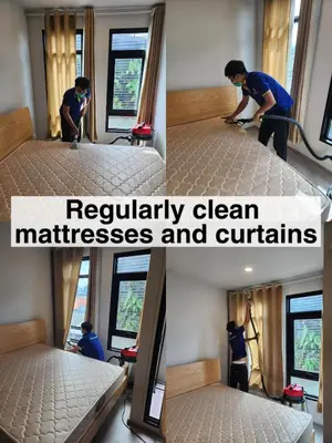 a man painting a bed in a room at Sky Apartment - Pool - BTS - Gym - Sauna in Bangkok