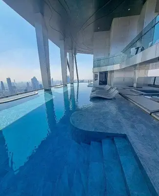 a swimming pool on the top of a building at Luxury duplex condominium Samyan area 28th fl near MRT in Bangkok