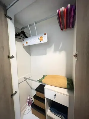 a walk in closet with a shelf and a drawer at Lumpini nawamin in Ban Bang Toei (1)