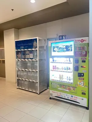 a grocery store with a refrigerator and a soda machine at Lumpini nawamin in Ban Bang Toei (1)
