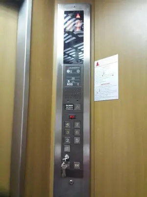 a control panel for an elevator in an airport at Sathitsit Mansion in Bangkok