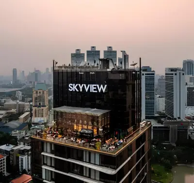 a building with the skyview sign on top of it at XX Mitr INN Sukhumvit Soi 2 in Bang Kapi