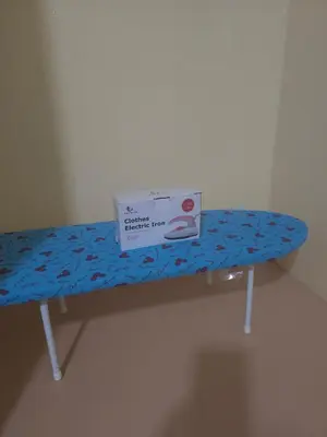 a pizza box sitting on top of a table at 114 Boutique style apartment with Air Con and free Wi-fi in Bangkok