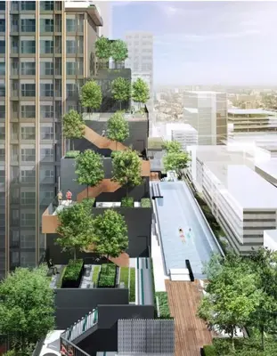 an aerial view of an apartment building with trees at Park payathai 28 in Bangkok