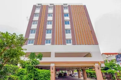 a tall building with a lot of windows at Grandview Ladprao Hotel in Bangkok