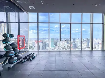 an office with a gym with a view of the city at New Residence in Central Bangkok Siam Paragon Central World in Pratunam