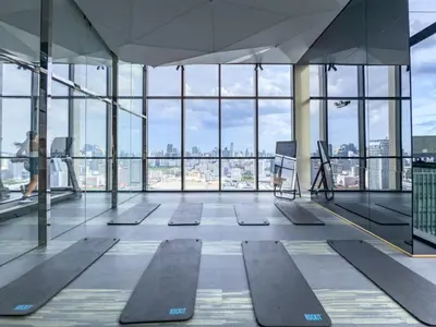 an empty room with a view of a city at New Residence in Central Bangkok Siam Paragon Central World in Pratunam