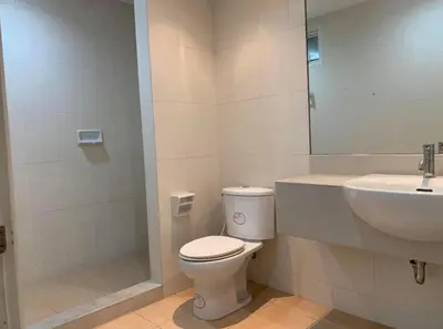 a bathroom with a toilet and a sink at City Living condo at BKK in Bangkok