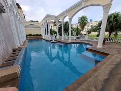 a swimming pool in the middle of a house at Spacious 3 Ensuite Bedrooms Townhouse in Rama 3, Bangkok in Bangkok