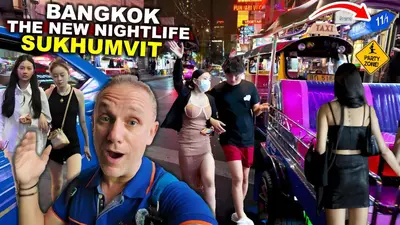 a picture of a man in a street with people walking at XX Mitr Inn Sukhumvit Soi 2 - มิตร อินน์ สุขุมวิท ซอย 2 BTS Nana in Bang Kapi