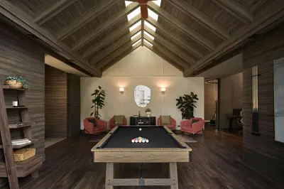 a large room with a pool table in the middle at Spacious 2 Bedrooms at MRT Rama 9 and Central R9 in Bangkok
