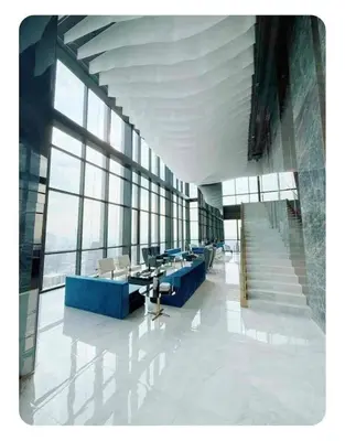 a large room with a staircase in a building at Luxury 1 Bedroom l BTS 2 mins l Pool and Gym in Pratunam