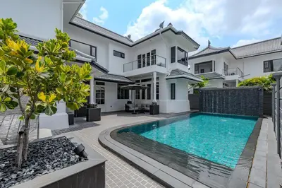 an image of a villa with a swimming pool at Thong Lo Sumptuous Double Pool Villa in Bangkok