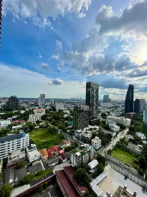 a view of a city with tall buildings at Supreme Spacious 2-Bedroom in Prime Location! BTS Thonglor in Bangkok