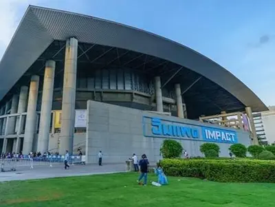 a large building with people standing outside of it at Hi Impact Muangthong T9 in Nonthaburi