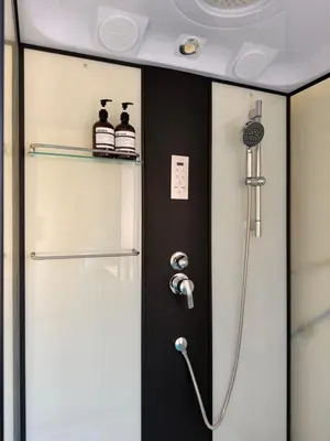 a shower in a bathroom with a shower at arakhouse อารักษ์เฮ้าส์ in Godown