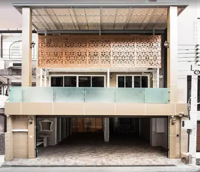 a building with awning on top of it at Residence at 49 in Bangkok