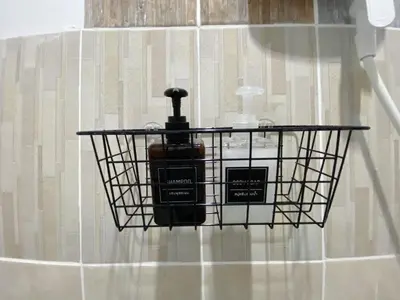 a soap holder on the wall of a bathroom at BAO The Giant Swing - เบา ศาลเจ้าพ่อเสือ ถนนตะนาว in Bangkok