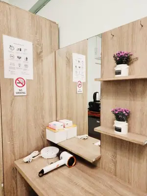 a table with a pair of scissors on top of it at 707-STP Homely room Free Wi-Fi and Near BTS in Sathani Bang Khen
