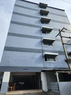 a tall grey building with a lot of windows at 707-STP Homely room Free Wi-Fi and Near BTS in Sathani Bang Khen