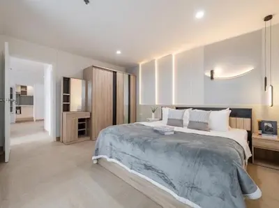 a large bedroom with a large bed in it at Cozy style 2BR 2B near street food in city in Bangkok