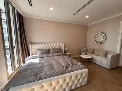 a large bedroom with a large bed and a couch at Luxury private swimming pool house for 10pax in Bangkok