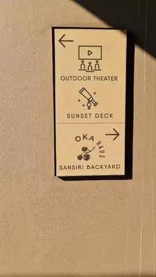 a sign for a summer deck on a wall at Perfect WFH 5 mins THONG LOR ultra luxury in Bangkok
