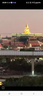 a bridge over a city with a train on it at Mansion phram6 B in Bangkok