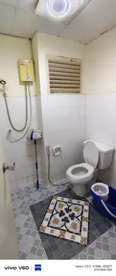 a bathroom with a toilet and a shower at Mansion phram6 B in Bangkok