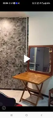 a wooden table with a mirror on top of it at Mansion phram6 B in Bangkok