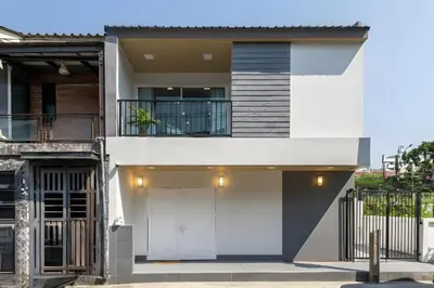 a modern house with a white facade at Bangkoks most beautiful modern villa centre in Bangkok