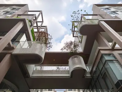 a view of the side of a building with balconies at Phahonyothin 35 Cozy 1BR Near BTS Chatuchak in Sathani Bang Khen
