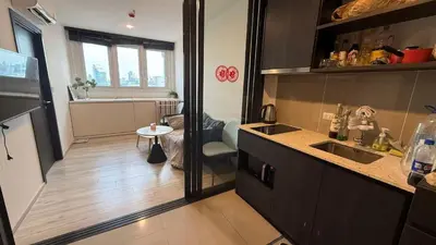 a kitchen with a sink and a counter top at Lovely home 2 in Ban Na Song