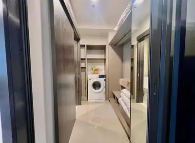 a laundry room with a washer and dryer at Lovely home 2 in Ban Na Song