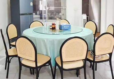a round table with chairs and a blue table cloth at Bangkok villa with 3 bedrooms in Ban Zong Katiam