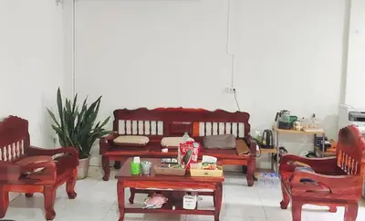 a living room with two chairs and a couch at Bangkok villa with 3 bedrooms in Ban Zong Katiam
