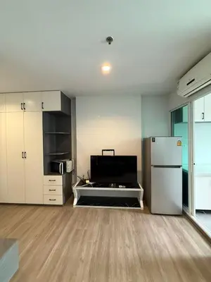 an empty kitchen with a refrigerator in a room at Bangson Monthly rental apartment in Bang Su
