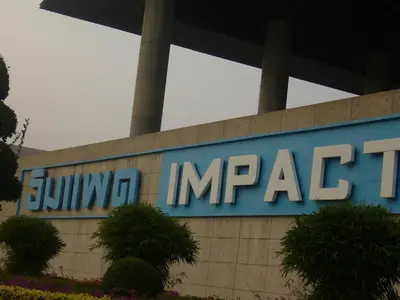 a sign for a juyn pacific sign on a building at Asia Don Mueang Bangkok Condominium in Nonthaburi