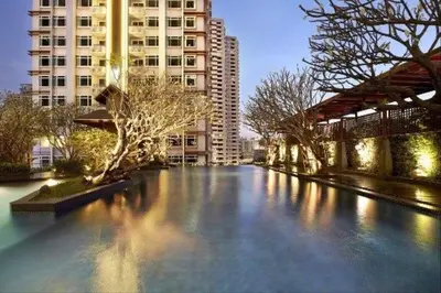 a large body of water in a city with buildings at Walking distance to Sukhumvit soi 11 Netflix 40sqm in Makkasan