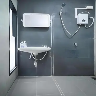 a bathroom with a sink and a shower at GO INN Silom - BTS St Louis Bangkok in Yan Nawa