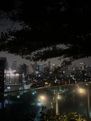 a view of a city skyline at night at Luxury Apt BTS EKKAMAI with pool sauna gym in Bangkok