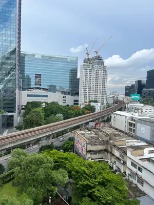a view of a city with a train track at Breezy 1BR Near BTS Udomsuk in Amphoe Phra Khanong
