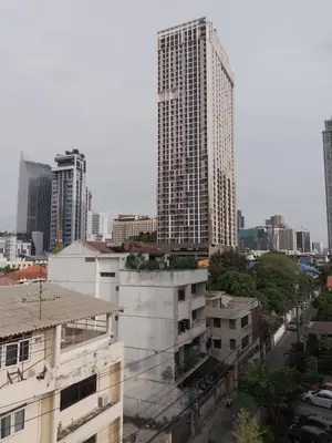 a view of a tall building in a city at Udee Bangkok Hostel in Bangkok