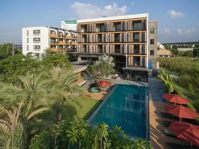 an aerial view of a hotel with a swimming pool at The Silver Palm Wellness Resort in Bangkok