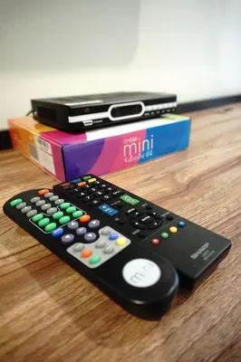 a remote control sitting on top of a table at The Arni Sukhumvit 101 in Bangkok